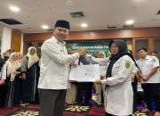 Sekda Kukar Serahkan SK Purna Tugas Kabag Perencanaan dan Keuangan Setdakab