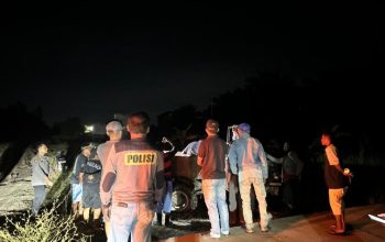 Evakuasi Jenazah Korban Di Kebun Sawit wilayah Kecamatan Anggana. (Dok. Polsek Anggana)