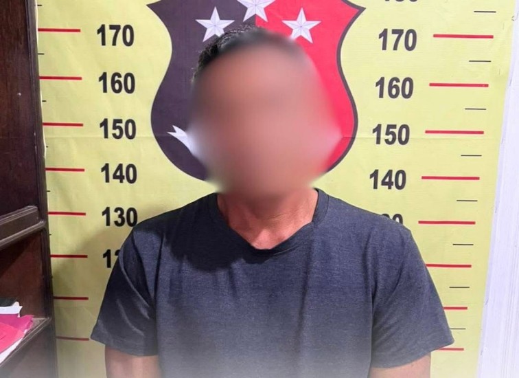 Tersangka SH, saat di amankan polisi. (Dok. Polsek Kembang Janggut)