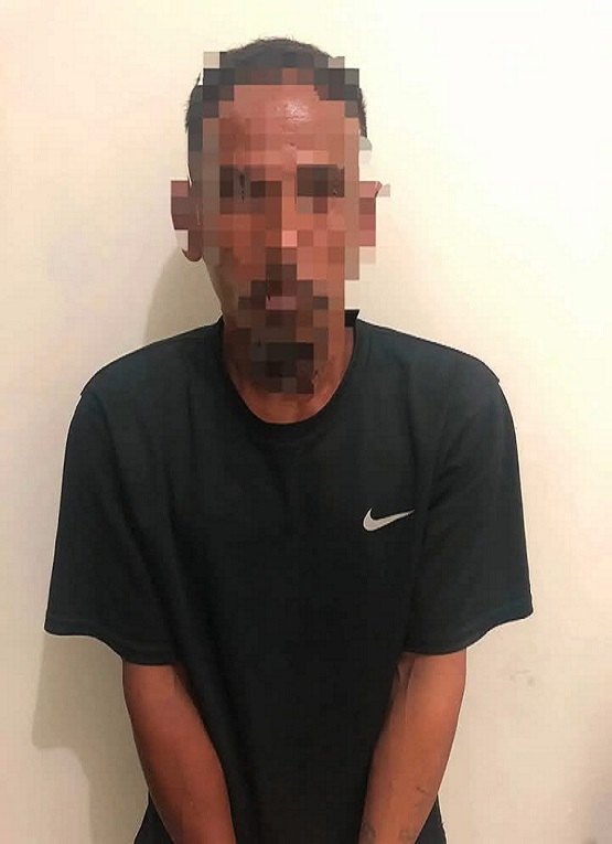 Pelaku Saat di Amankan Petugas Kepolisian. (Dok. Polsek Kenohan)