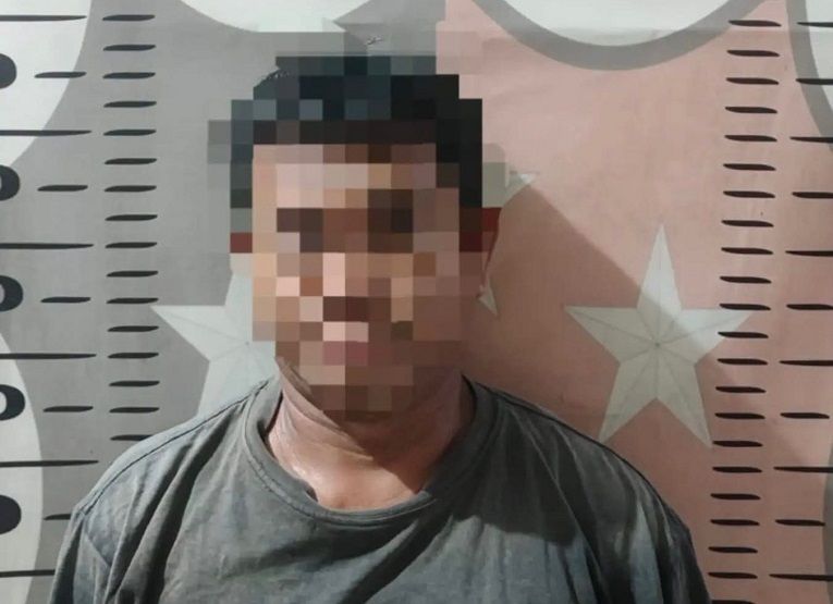 Pelaku Saat di Amankan Petugas Kepolisian. (Dok. Polsek Muara Kaman)