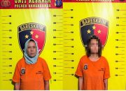 Gara-Gara Saling Tatap, Ibu dan Anak di Sangasanga Terlibat Pengeroyokan 11 Kedua Pelaku Saat di Amankan Petugas Kepolisian. (Dok. Polsek Sangasanga)