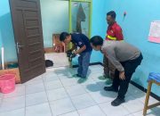 Petugas Kepolisian Saat Melakukan Olah TKP. (Dok.Polsek Loa Kulu)