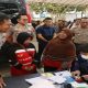 Polres Kukar Dekatkan Layanan Kesehatan Gratis kepada Pengemudi Ojol dan Masyarakat